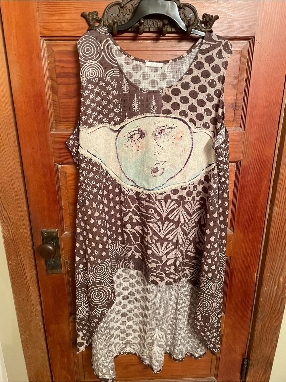 bohemian patchwork high-low tunic features a unique face graphic - Picture 2 of 6